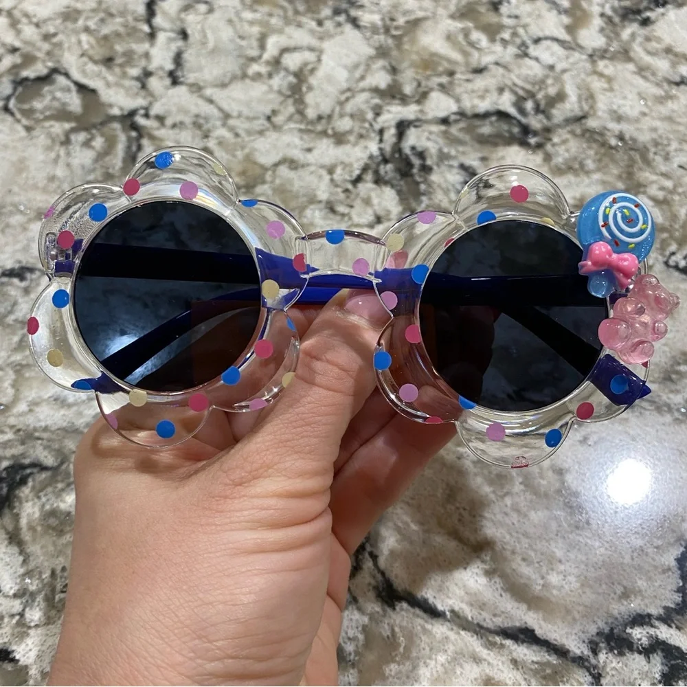 Girls flower shaped blue multi colored dot sunglasses